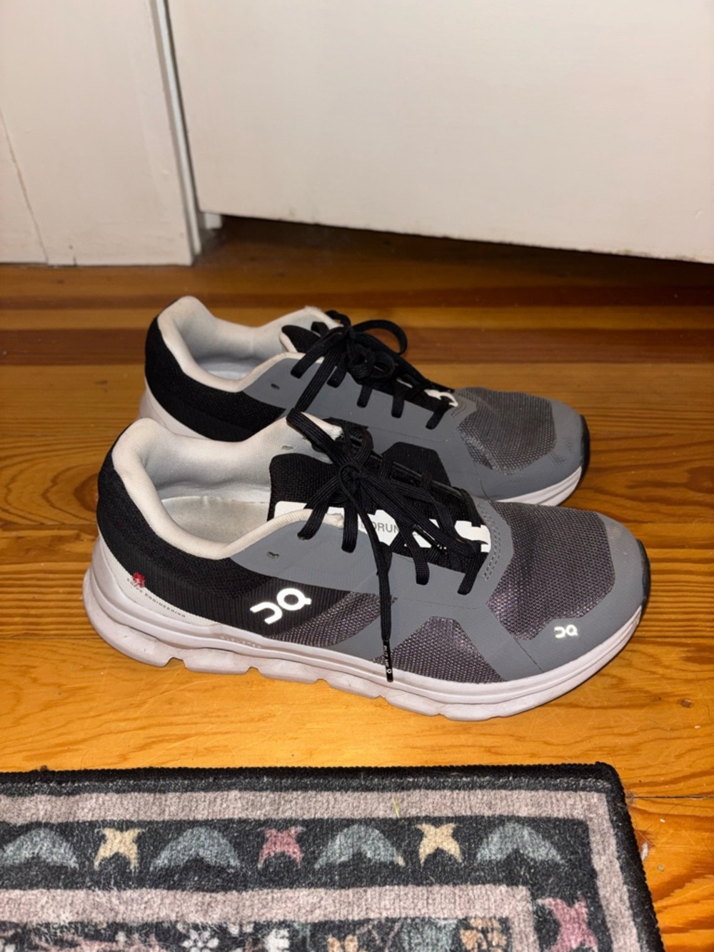 On Running Gray and Black Cloud Sneakers